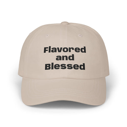 Beige cap with 'Flavored and Blessed' text on a white background